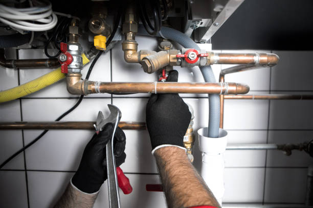 plumber working at home, work at the heating installation plumber working at home, work at the heating installation